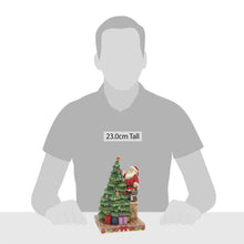 Load image into Gallery viewer, Santa Decorating Tree Jim Shore
