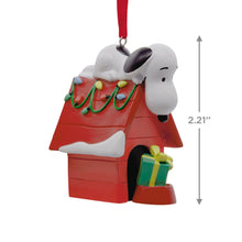 Load image into Gallery viewer, Peanuts® Snoopy on Holiday Doghouse Hallmark Ornament
