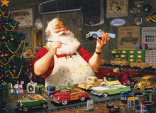 Load image into Gallery viewer, Santa Painting Cars - 1000 Piece Puzzle by Cobble Hill
